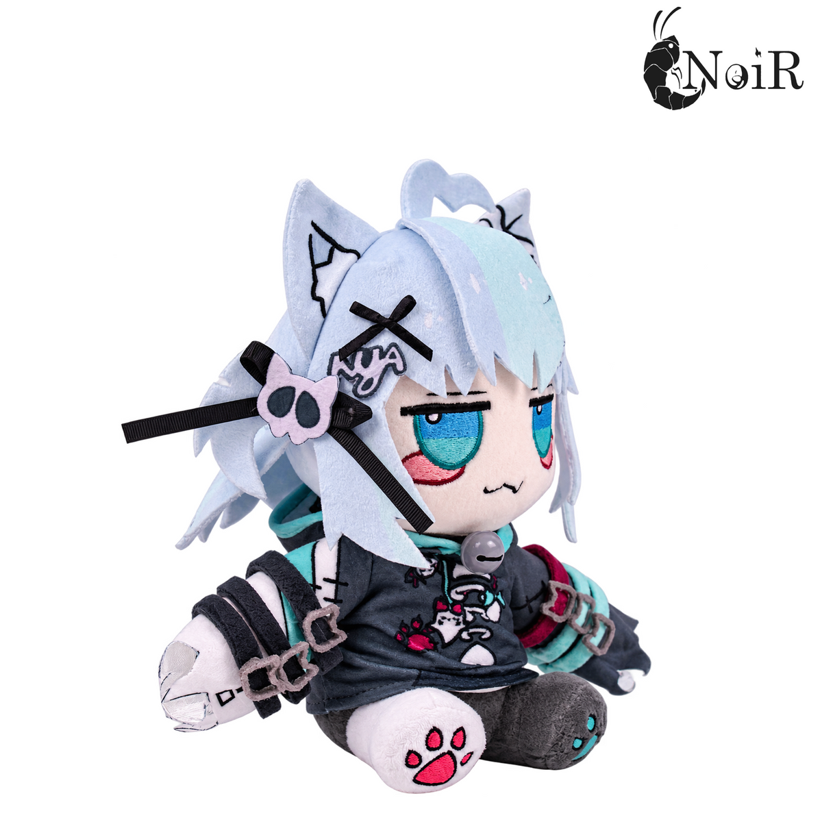 Nani plushie left three-quarter view with skull hair clip, black ribbon, NYA patch and red paw sole
